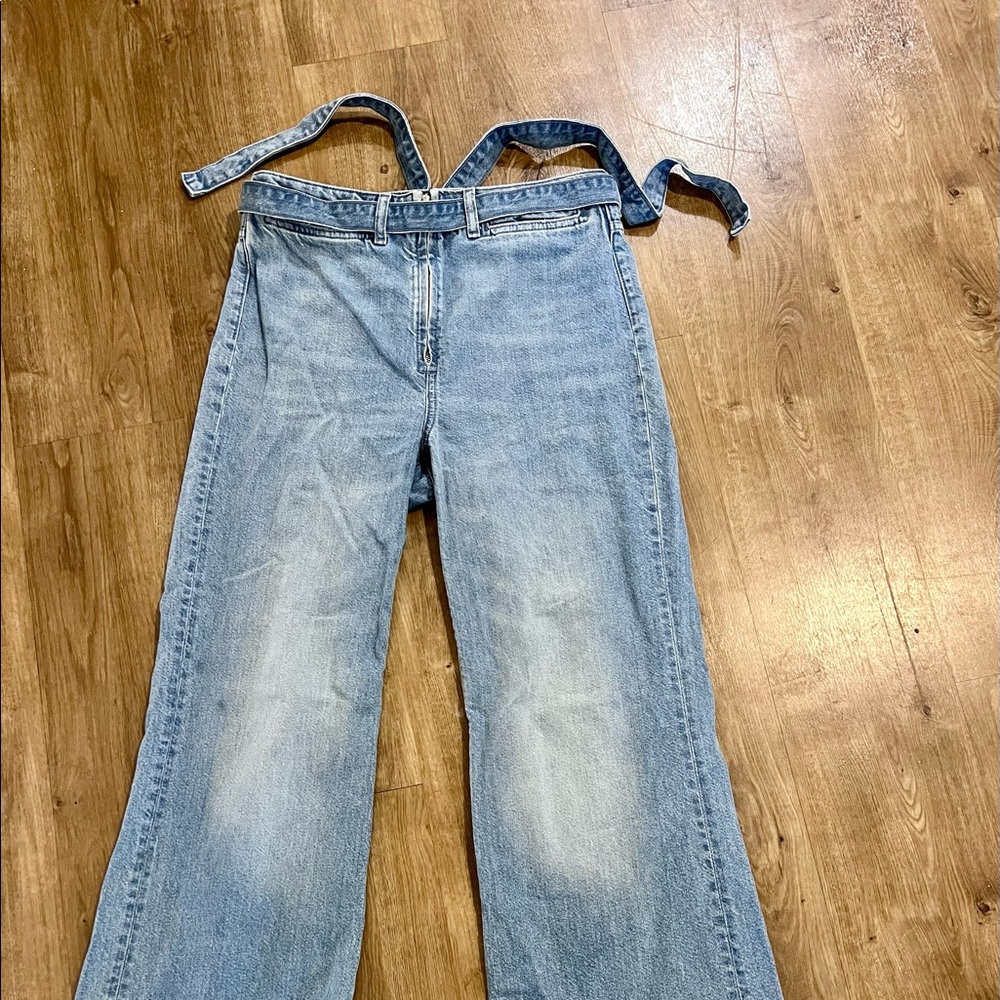 CUTEST high waisted light wash flared jeans with built in belt